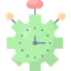 A green clock featuring four hands in different colors, indicating various times. 